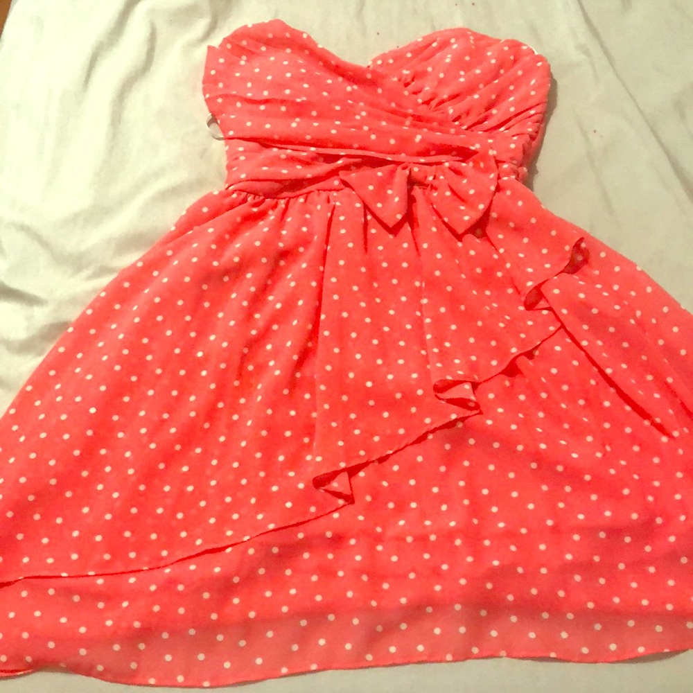 Pink strapless dress with white polka dots